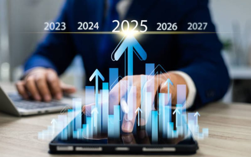 Set goals and strategy for 2025,Businessman touch icon of year 2025 with target arrow on virtual screen,Planning for future growth and success,Development to achieve goals and success,Investment